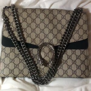 Medium Gucci Dionysus GG logo Black Suede 11in.Lenght 9in.ht.Apox 4 in.depth.